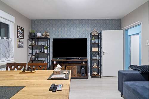 Wohnzimmer - Mehrfamilienhaus, Wohnhaus mit 292,00 m&sup2; in Rodgau zum Kaufen