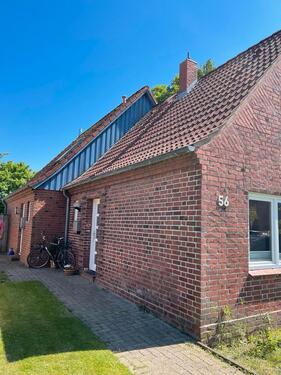 Foto - Einfamilienhaus mit Einliegerwohnung