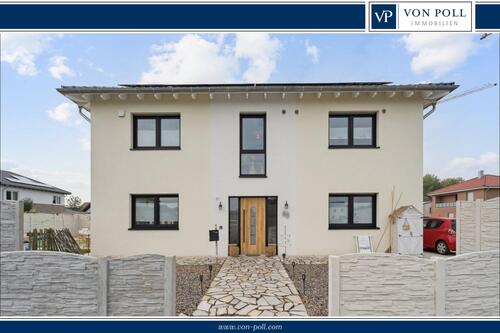 Titelbild - Attraktives Zweifamilienhaus in Olfen–modern, nachhaltig und mit KfW 40+ Standard