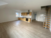 Wohnbereich mit Einbauküche - Etagenwohnung mit 54,20 m² in Binz zum Kaufen