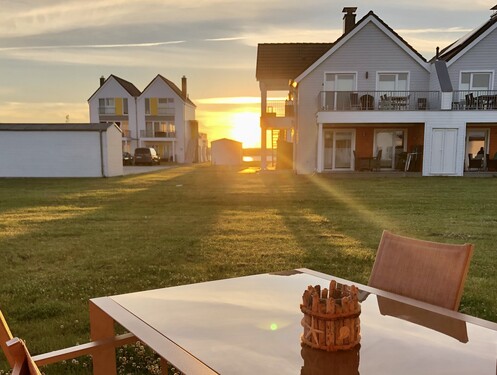 Goldmomente inklusive - Gold wert: Sonnenuntergang & Ferienwohnung in einem