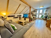 Wohnzimmer im Dachgeschoss - Einfamilienhaus mit 190,00 m&sup2; in Viereck zum Kaufen