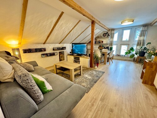 Wohnzimmer im Dachgeschoss - Einfamilienhaus mit 190,00 m&sup2; in Viereck zum Kaufen