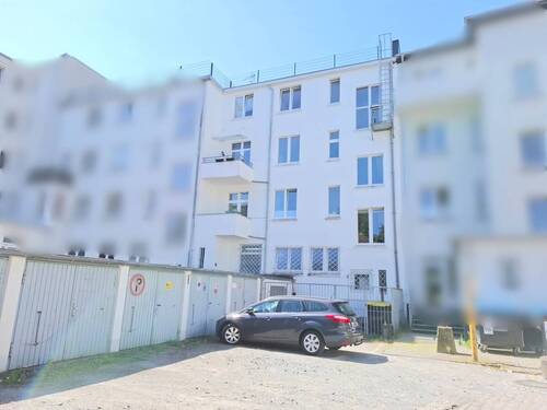 Hausrückansicht - Recklinghausen-Zentrum! Vollvermietetes Wohn- und Geschäftshaus mit 6 Garagen als Renditeobjekt!